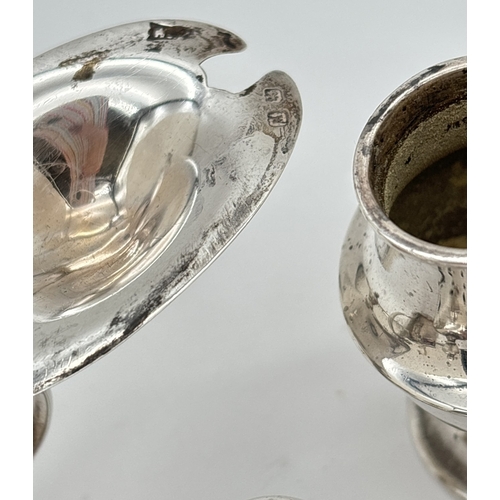 1177 - An Art Deco silver mustard pot and matching pepperette. An antique silver mustard pot of oval shape ... 