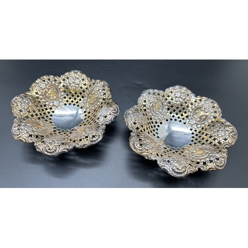 1181 - A pair of James Dixon & Sons Victorian silver bon bon dishes of pierced work design and with scroll ... 