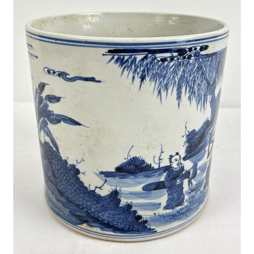 1278 - A large Chinese blue & white ceramic brush pot of cylindrical form, with hand painted figural scene.... 