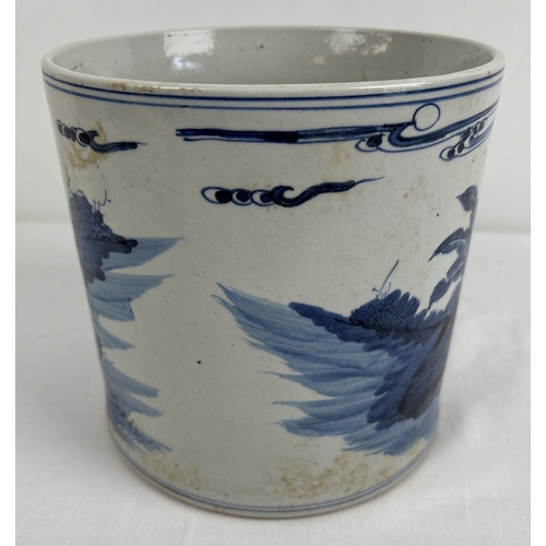 1278 - A large Chinese blue & white ceramic brush pot of cylindrical form, with hand painted figural scene.... 