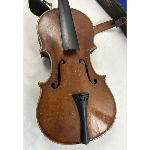 1307 - A vintage 3/4 child's violin with bow in original carry case. No strings but case contains chin rest... 