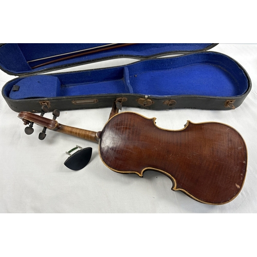 1307 - A vintage 3/4 child's violin with bow in original carry case. No strings but case contains chin rest... 