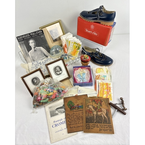 1332 - A vintage wire stationery tray with assorted vintage collectables to include boxed Start-rite childr... 