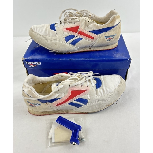 1357 - A Boxed pair of men’s Reebok running track shoes or spikes, in red white & blue. UK size 10, EU size... 