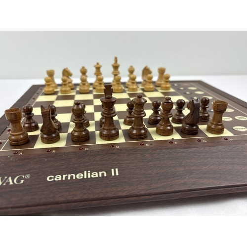 1 - A vintage Novag Carnelian II chess computer, model 1024, with carved wooden playing pieces & digital... 