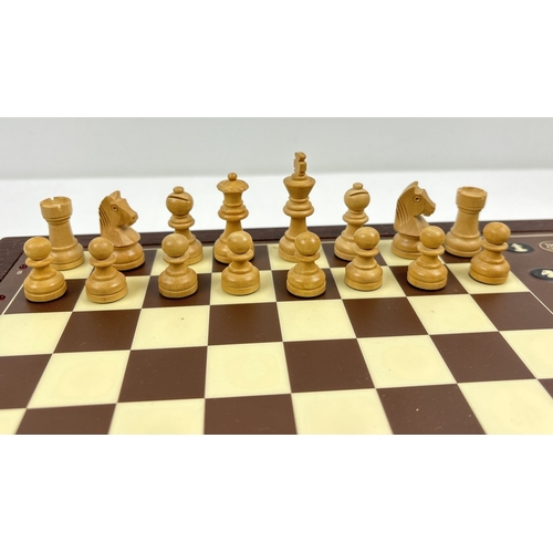 1 - A vintage Novag Carnelian II chess computer, model 1024, with carved wooden playing pieces & digital... 