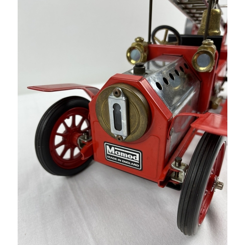 A Mamod FE1 steam powered model fire engine, unboxed, with red