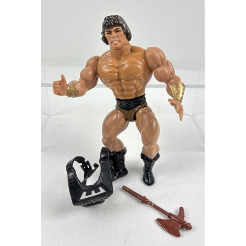 Vintage 1981 Masters of the Universe Wun-Dar the Savage He-Man action figure from Mattel. Offered as part of a 'buy 3 get 1 free' deal from Mattel in the early 1980's. Comes with black Zodiac armour and brown axe. Marked 'Mattel Inc 1981 Taiwan' under neck & also back of body. Has had gauntlets painted gold.