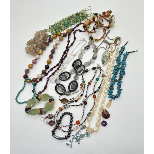 1073 - A collection of natural and semi precious stone jewellery necklaces, bracelets, pendants and earring... 