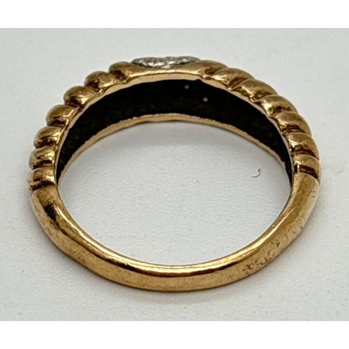 1032 - A vintage 9ct gold twist design dome style ring set with 5 small diamonds. Fully hallmarked inside b... 