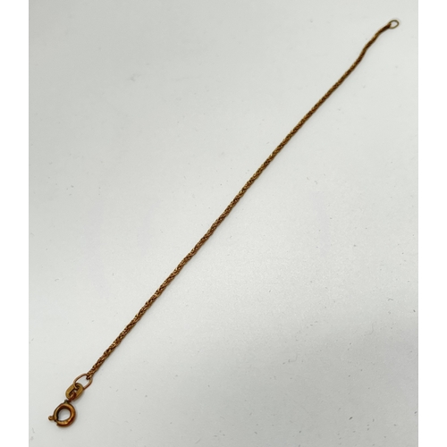 1038 - A 9ct yellow gold 7.5 inch rope chain bracelet with spring ring clasp. Gold mark on clasp and chain ... 