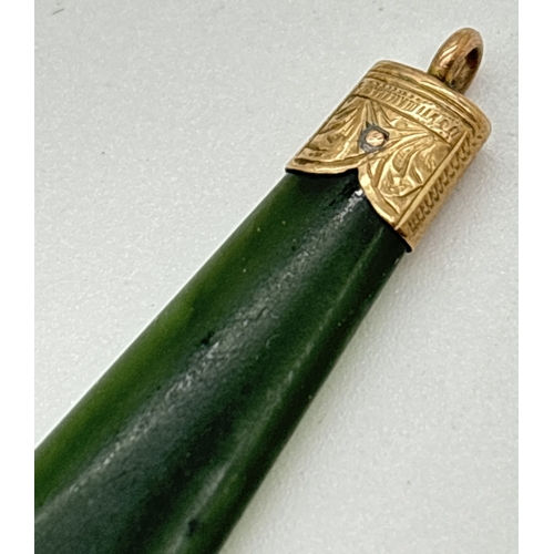 1053 - A vintage Nephrite Jade pendant with engraved gold cap and bale. Gold unmarked but tests as 9ct. App... 