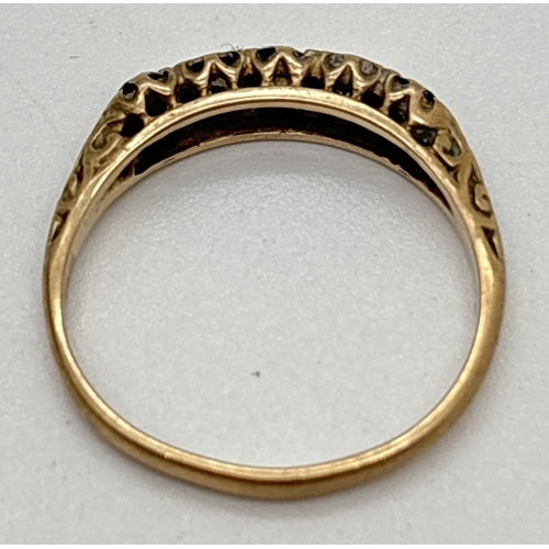 1058 - A vintage 9ct gold sapphire and diamond half eternity ring with scroll detail to shoulders. Size J. ... 