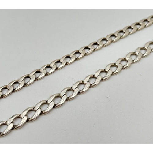 1068 - 2 heavy white metal curb chain bracelets, for scrap or repair. One with worn marks to fixing. 8.5