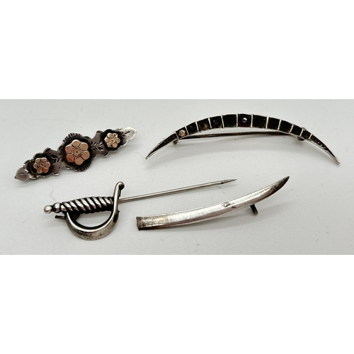 1070 - 3 vintage silver brooches in various conditions.  A half moon brooch set with coloured stones (some ... 