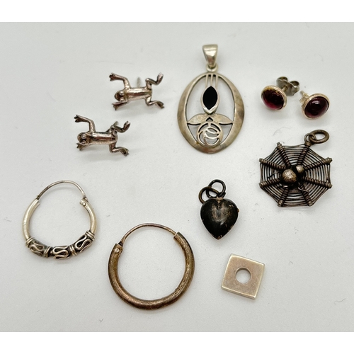 1071 - A small collection of silver and white metal jewellery. To include frog earrings, Rennie Mackintosh ... 