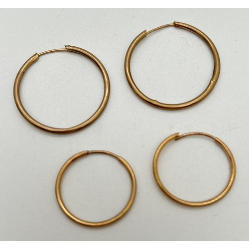 1072 - 2 pairs of gold hoop earrings. Both pairs unmarked but test as 9ct gold. Small split to larger pair.... 