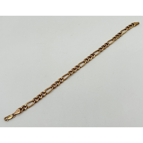 1077 - A 9ct yellow gold 7