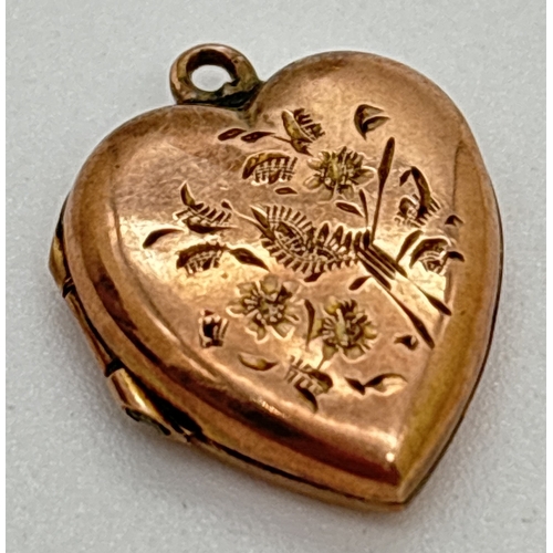 1075 - A small 9ct gold (front and back) heart shaped locket with floral engraved decoration. Approx. 1.5cm... 