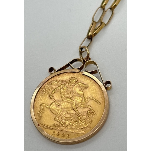 1005 - A 1926 George V gold sovereign in a 9ct gold pendant mount with scroll detail to top. On a 26