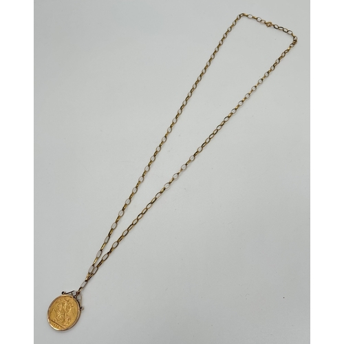 1005 - A 1926 George V gold sovereign in a 9ct gold pendant mount with scroll detail to top. On a 26