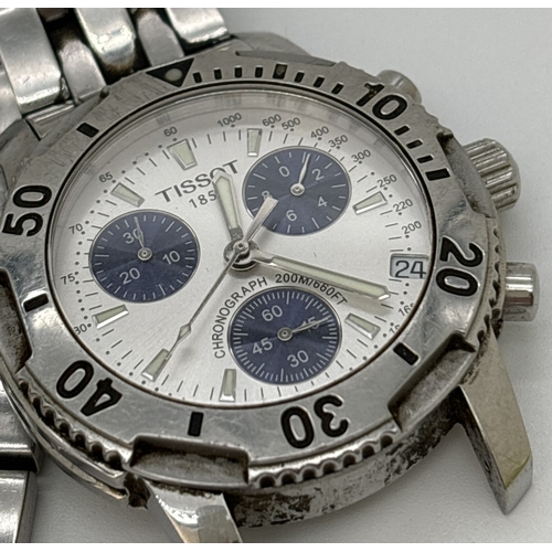 1176 - A men's Tissot stainless steel chronograph wristwatch. Stainless steel case and strap with white fac... 