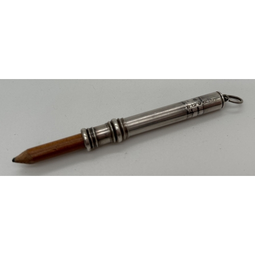 1233 - 3 vintage propelling pencils. An Edwardian silver pencil with turned detail to slider, fully hallmar... 