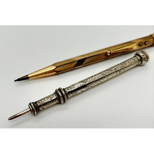 1233 - 3 vintage propelling pencils. An Edwardian silver pencil with turned detail to slider, fully hallmar... 