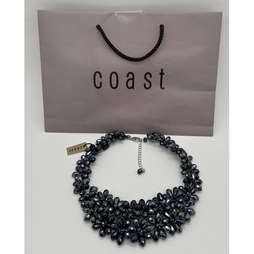 1138 - A floral design statement collar style necklace By Coast, brand new with tag and bag.  Made from met... 