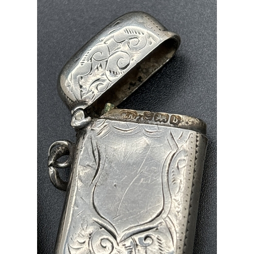 1219 - 2 Victorian silver vesta cases with engraved scroll & foliate design & empty shield shaped cartouche... 