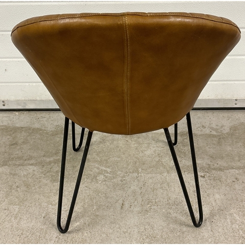 1416 - A retro style brown leather tub chair with black metal legs. Approx. 74cm tall.