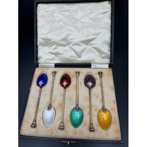 1206 - A boxed set of Art Deco silver gilt and coloured enamel seal top demitasse spoons. Each fully hallma... 