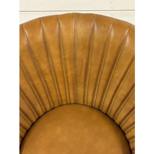 1416 - A retro style brown leather tub chair with black metal legs. Approx. 74cm tall.