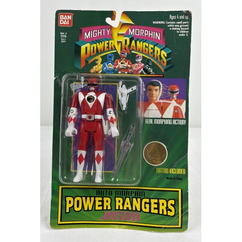 Mighty Morphin Power Rangers Auto Morphin Jason action figure - carded and sealed, from Bandai 1994. With Morphing action from teenager to Power Ranger. Comes with 2 weapons and tattoo.