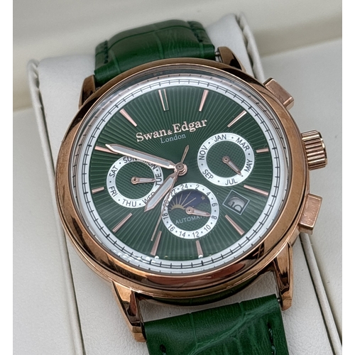 Limited Edition automatic chronograph wristwatch by Swan & Edgar SE10069325, in green, boxed as new. Rose gold tone case, green enamel face with sun ray design. Rose gold hour markers & hands with luminous detail to hands. Seconds hand and date function. Green leather strap, with original tag, QC sticker to back of case. With sealed warranty card. Working.