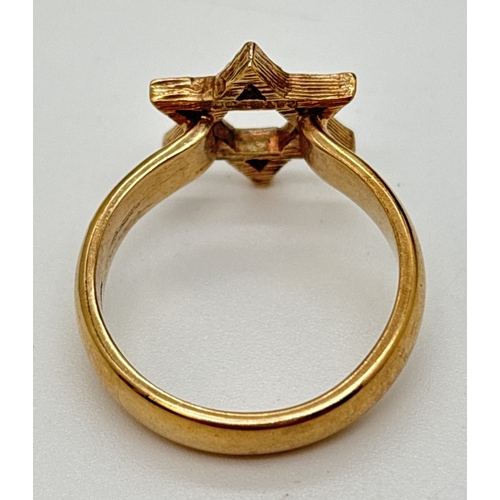 12 - A 9ct gold Star Of David ring. Fully hallmarked inside band. Ring size O. Weight approx. 4.8g.