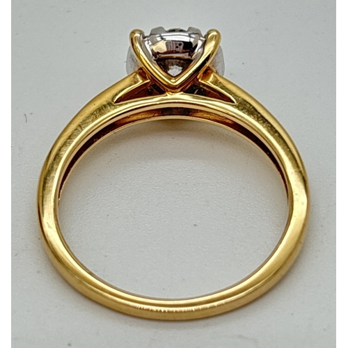 37 - An 18ct yellow gold .50ct diamond ring with cathedral style mount. Central round cut diamond surroun... 