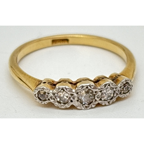 38 - A vintage 18ct gold and diamond 5 stone eternity ring. Graduating sized diamonds in an illusion sett... 