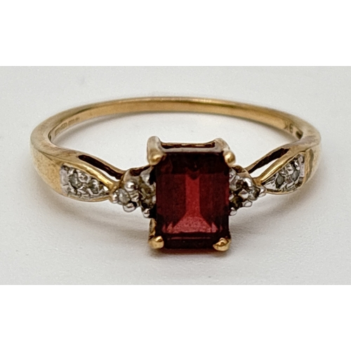 71 - A 9ct gold garnet and diamond dress ring. A central square cut garnet with 3 small round cut diamond... 