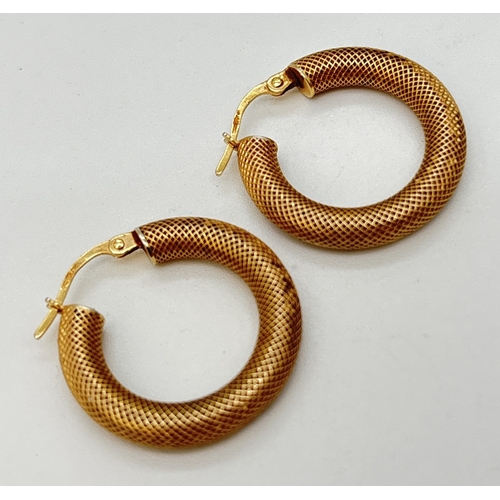 72 - A pair 0f 9ct gold honeycomb design huggie style hoop earrings. Approx. 2.25cm diameter. Hallmarked ... 