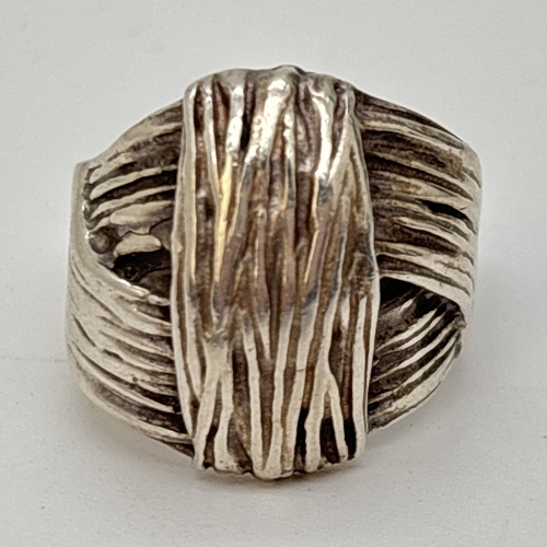 86 - A large silver weave design dome ring. Stamped 925 inside band. Size P. Weight approx. 11.2g.