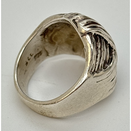 86 - A large silver weave design dome ring. Stamped 925 inside band. Size P. Weight approx. 11.2g.