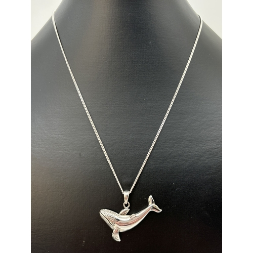 88 - A 925 silver whale pendant on an 18