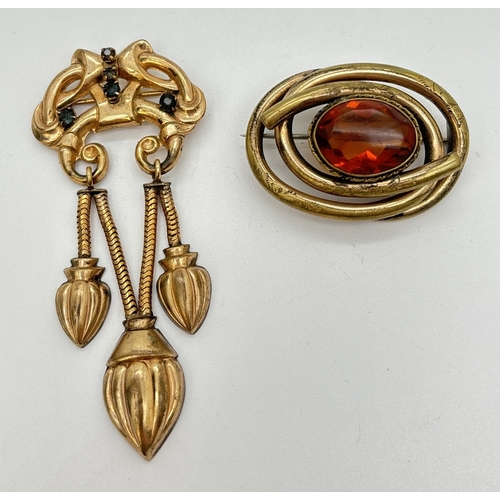 89 - 2 antique brooches. A gold filled drop style brooch by White Co. 1/20th 12kt gold filled set with bl... 