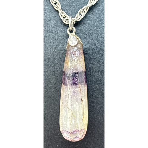 91 - A Blue John teardrop shaped pendant, on a 22