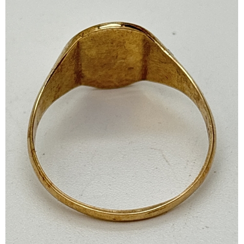 98 - A 9ct gold signet ring with embossed Star Of David. Gold marks inside band. Size T, weight approx. 3... 