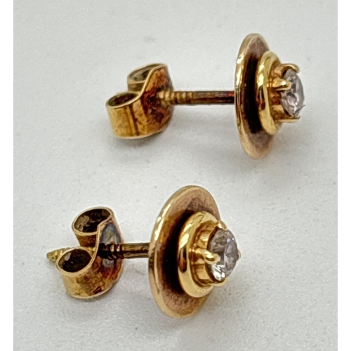 133 - A pair of bespoke made yellow gold diamond set stud earrings with butterfly screw backs. Circular st... 