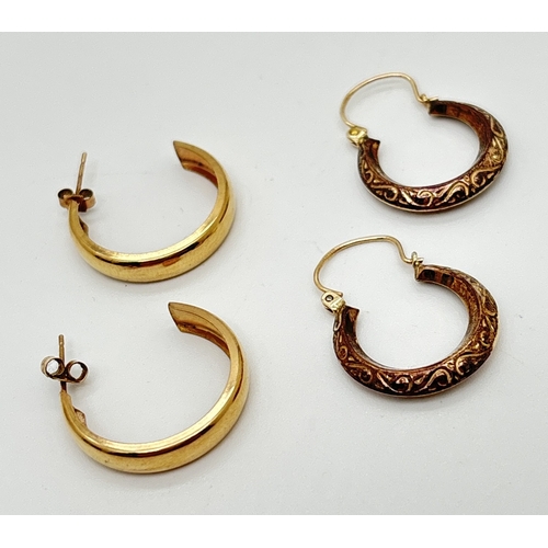 186 - 2 pairs of yellow gold hoop earrings. A pair of creole style hoops with scroll decoration,  hallmark... 