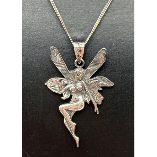 187 - A silver Art Nouveau design fairy pendant on an 18