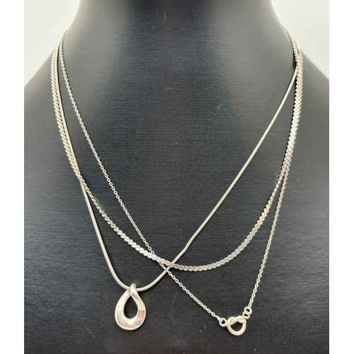 178 - 3 silver necklaces. A fixed pendant lovers knot necklace, a flat S link chain necklace and a snake c... 